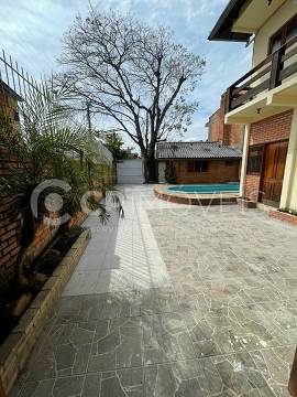 Imagem Sobrado com 4 Quartos à Venda, 233 m²em Santa Maria Goretti - Porto Alegre