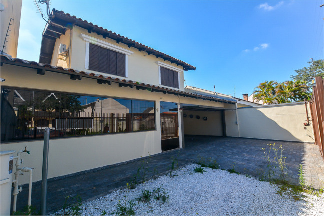 Imagem Casa com 3 Quartos à Venda, 271 m² em Jardim das Américas - Curitiba Imagem Casa com 3 Quartos à Venda, 271 m² em Jardim das Américas - Curitiba