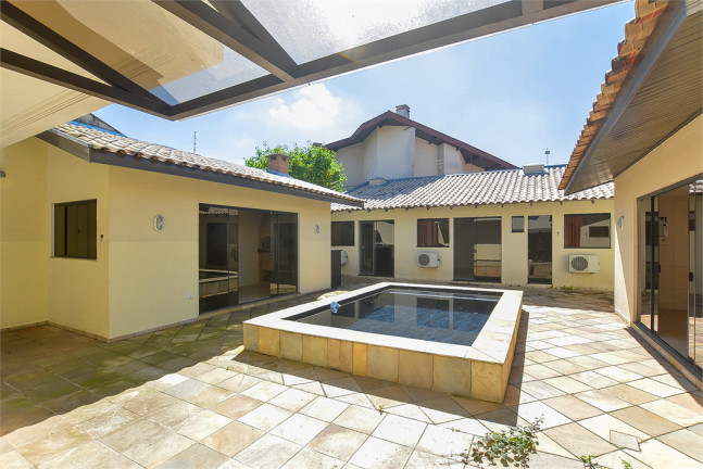 Imagem Casa com 3 Quartos à Venda, 271 m² em Jardim das Américas - Curitiba Imagem Casa com 3 Quartos à Venda, 271 m² em Jardim das Américas - Curitiba