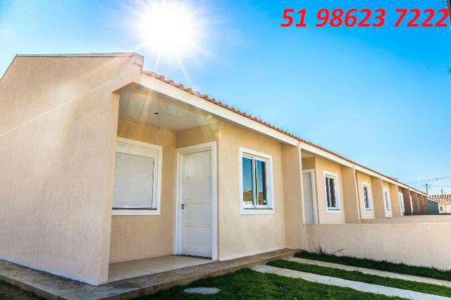 Imagem Casa de Condomínio com 2 Quartos à Venda, 48 m² em Jardim Algarve - Alvorada Imagem Casa de Condomínio com 2 Quartos à Venda, 48 m² em Jardim Algarve - Alvorada