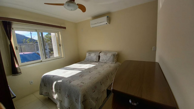 Imagem Casa com 3 Quartos à Venda, 99 m² em Hípica - Porto Alegre Imagem Casa com 3 Quartos à Venda, 99 m² em Hípica - Porto Alegre