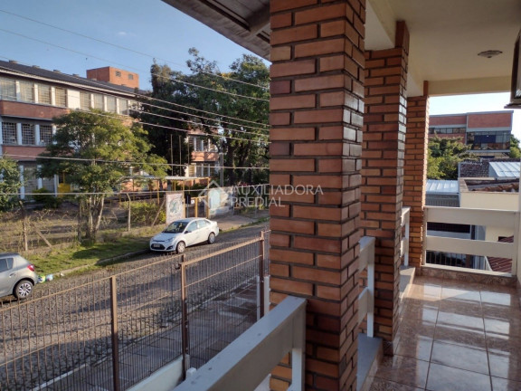 Imagem Casa com 3 Quartos à Venda, 185 m² em Santa Maria Goretti - Porto Alegre Imagem Casa com 3 Quartos à Venda, 185 m² em Santa Maria Goretti - Porto Alegre