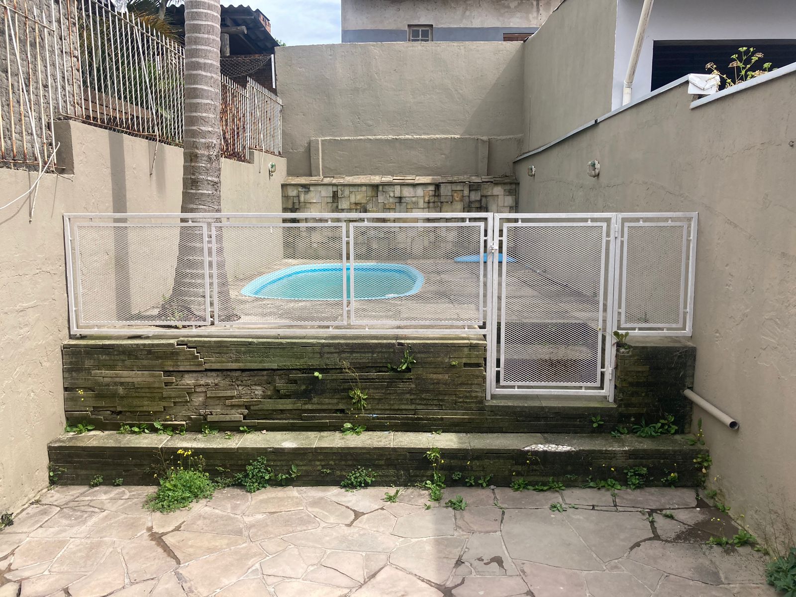 Imagem Casa com 2 Quartos à Venda, 147 m² em Hípica - Porto Alegre