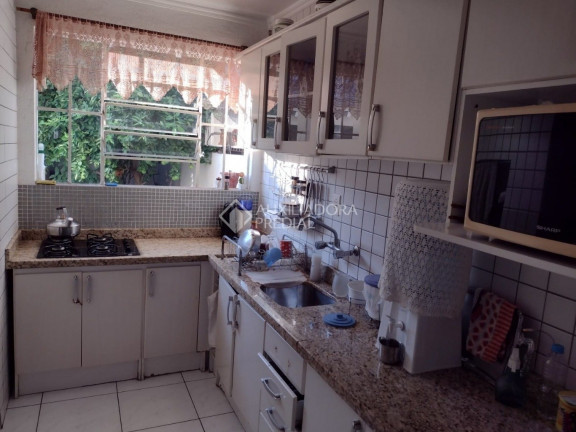 Imagem Casa com 3 Quartos à Venda, 185 m² em Santa Maria Goretti - Porto Alegre Imagem Casa com 3 Quartos à Venda, 185 m² em Santa Maria Goretti - Porto Alegre