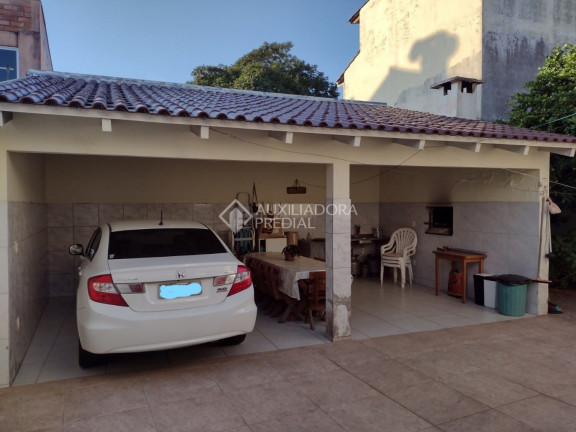 Imagem Casa com 3 Quartos à Venda, 185 m² em Santa Maria Goretti - Porto Alegre Imagem Casa com 3 Quartos à Venda, 185 m² em Santa Maria Goretti - Porto Alegre