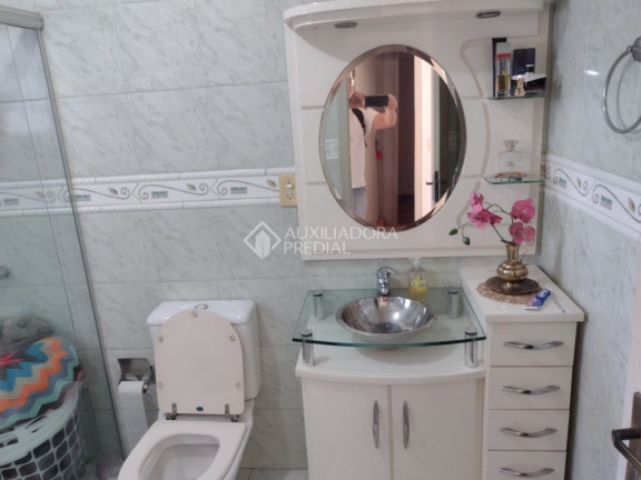 Imagem Casa com 3 Quartos à Venda, 185 m² em Santa Maria Goretti - Porto Alegre Imagem Casa com 3 Quartos à Venda, 185 m² em Santa Maria Goretti - Porto Alegre