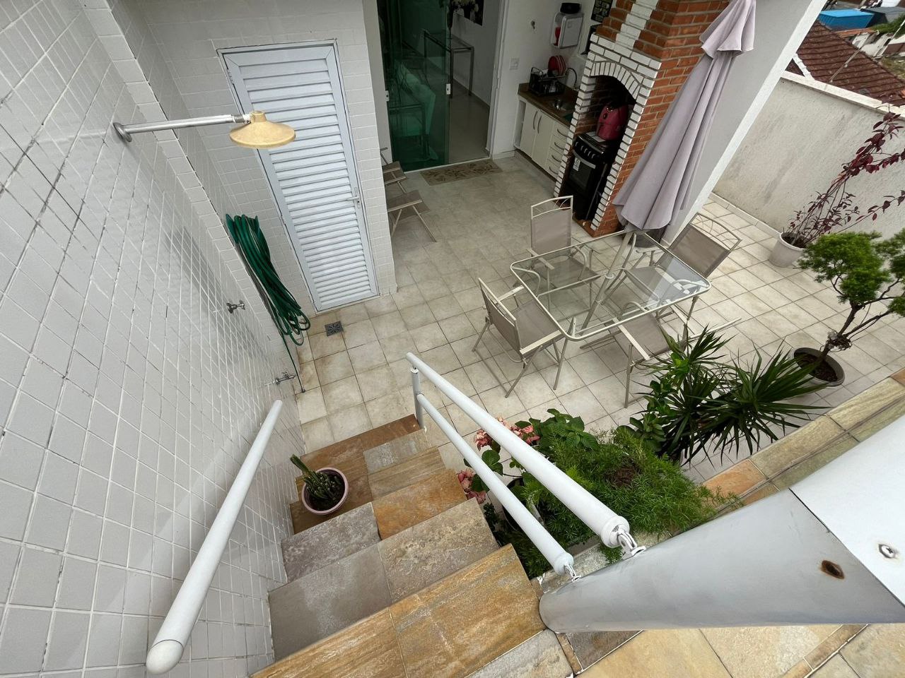 Imagem Casa com 4 Quartos à Venda, 239 m²em Embaré - Santos