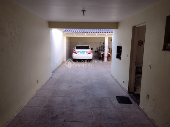 Imagem Casa com 3 Quartos à Venda, 185 m² em Santa Maria Goretti - Porto Alegre Imagem Casa com 3 Quartos à Venda, 185 m² em Santa Maria Goretti - Porto Alegre