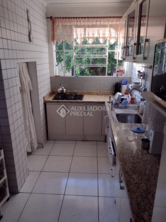 Imagem Casa com 3 Quartos à Venda, 185 m² em Santa Maria Goretti - Porto Alegre Imagem Casa com 3 Quartos à Venda, 185 m² em Santa Maria Goretti - Porto Alegre
