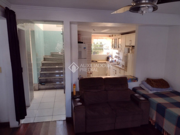 Imagem Casa com 3 Quartos à Venda, 185 m² em Santa Maria Goretti - Porto Alegre Imagem Casa com 3 Quartos à Venda, 185 m² em Santa Maria Goretti - Porto Alegre