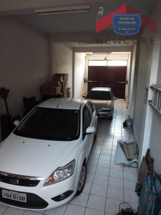 Imagem Casa com 4 Quartos à Venda, 315 m² em Centro - Pelotas