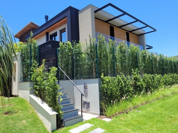 Imagem Casa com 5 Quartos à Venda, 350 m² em Jurerê Internacional - Florianópolis Imagem Casa com 5 Quartos à Venda, 350 m² em Jurerê Internacional - Florianópolis