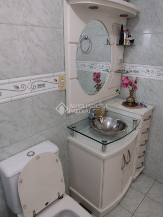 Imagem Casa com 3 Quartos à Venda, 185 m² em Santa Maria Goretti - Porto Alegre Imagem Casa com 3 Quartos à Venda, 185 m² em Santa Maria Goretti - Porto Alegre