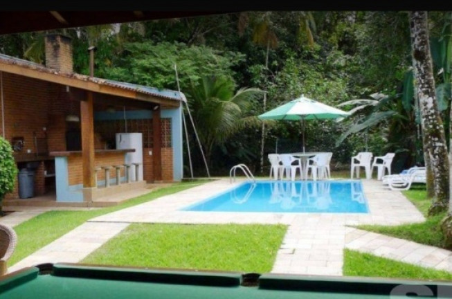 Imagem Casa com 5 Quartos à Venda, 237 m² em Riviera - Bertioga