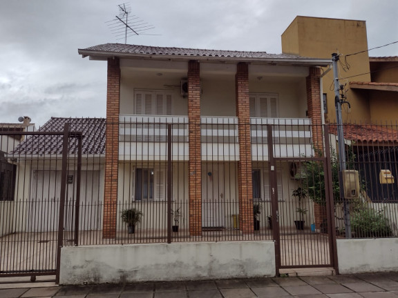 Imagem Casa com 3 Quartos à Venda, 185 m² em Santa Maria Goretti - Porto Alegre Imagem Casa com 3 Quartos à Venda, 185 m² em Santa Maria Goretti - Porto Alegre