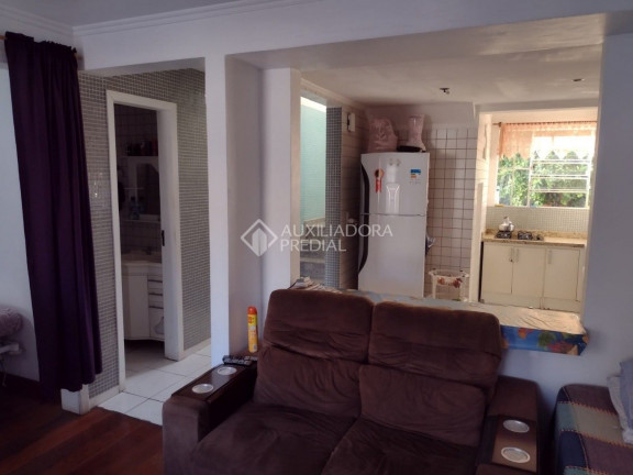 Imagem Casa com 3 Quartos à Venda, 185 m² em Santa Maria Goretti - Porto Alegre Imagem Casa com 3 Quartos à Venda, 185 m² em Santa Maria Goretti - Porto Alegre
