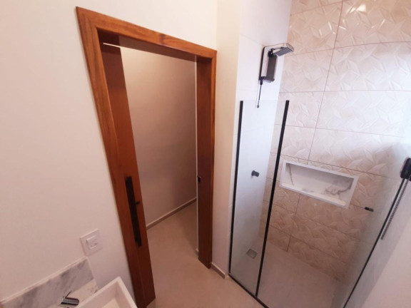 Imagem Casa com 2 Quartos à Venda, 73 m² em Balneário dos Golfinhos - Caraguatatuba