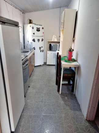 Imagem Casa com 4 Quartos à Venda, 276 m² em Arco íris - Capão Da Canoa