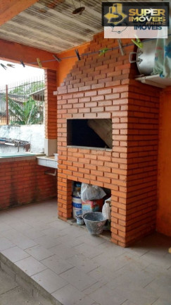 Imagem Casa com 3 Quartos à Venda, 235 m² em Centro - Pelotas