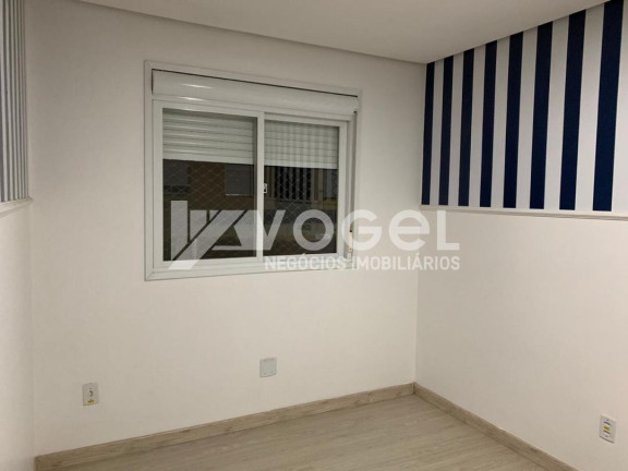 Imagem Casa com 3 Quartos à Venda, 135 m² em Olaria - Canoas Imagem Casa com 3 Quartos à Venda, 135 m² em Olaria - Canoas