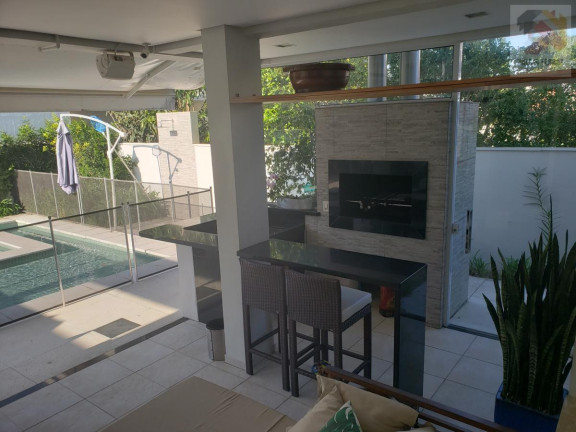 Imagem Casa com 5 Quartos à Venda, 450 m² em Jurerê Internacional - Florianópolis Imagem Casa com 5 Quartos à Venda, 450 m² em Jurerê Internacional - Florianópolis