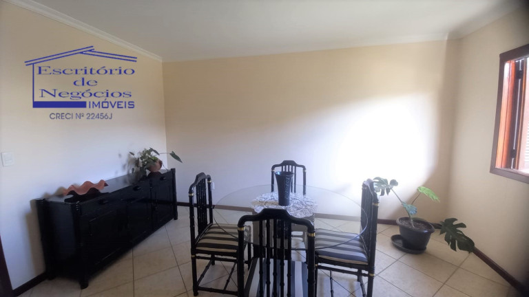 Imagem Casa com 4 Quartos à Venda, 260 m² em Vila Nova - Porto Alegre Imagem Casa com 4 Quartos à Venda, 260 m² em Vila Nova - Porto Alegre