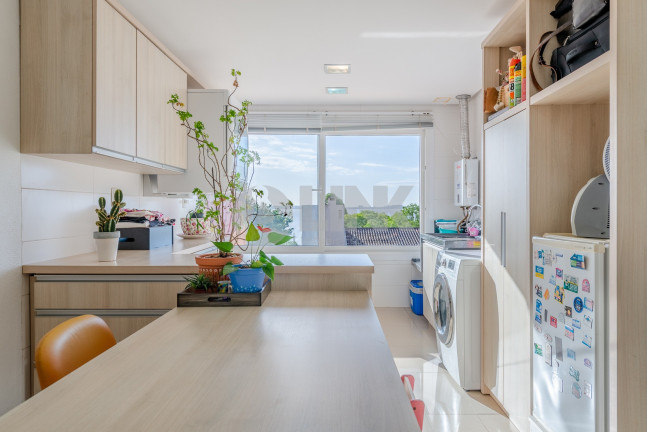 Imagem Casa com 4 Quartos à Venda, 450 m² em Vila Assunção - Porto Alegre