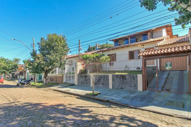 Imagem Casa com 3 Quartos à Venda, 205 m² em Tristeza - Porto Alegre Imagem Casa com 3 Quartos à Venda, 205 m² em Tristeza - Porto Alegre