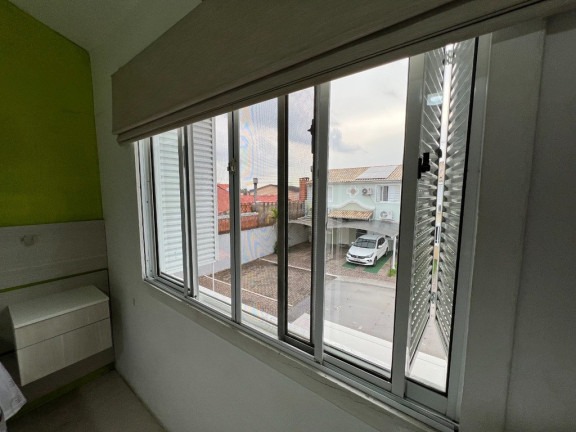 Imagem Casa com 2 Quartos à Venda, 100 m² em Rio Branco - Canoas Imagem Casa com 2 Quartos à Venda, 100 m² em Rio Branco - Canoas