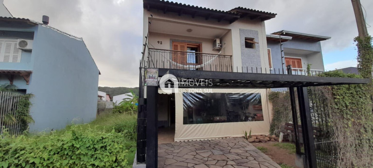 Imagem Casa com 3 Quartos à Venda, 179 m²
