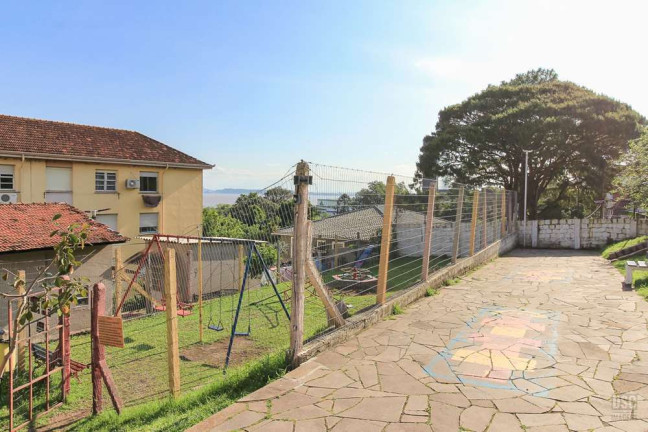 Imagem Imóvel com 2 Quartos à Venda, 51 m² em Cristal - Porto Alegre Imagem Imóvel com 2 Quartos à Venda, 51 m² em Cristal - Porto Alegre