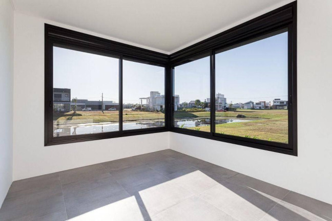 Imagem Casa de Condomínio com 3 Quartos à Venda, 205 m² em Torres