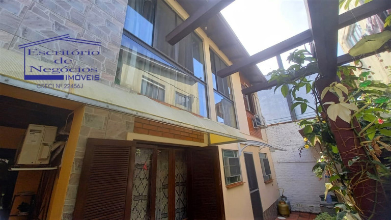 Imagem Casa com 5 Quartos à Venda, 280 m² em Camaquã - Porto Alegre Imagem Casa com 5 Quartos à Venda, 280 m² em Camaquã - Porto Alegre
