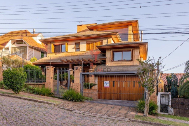 Imagem Casa com 4 Quartos à Venda, 498 m² em Ipanema - Porto Alegre Imagem Casa com 4 Quartos à Venda, 498 m² em Ipanema - Porto Alegre