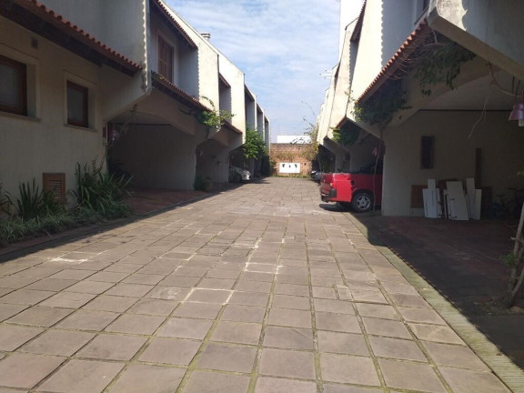Imagem Casa de Condomínio com 3 Quartos à Venda, 230 m² em Santa Tereza - Porto Alegre