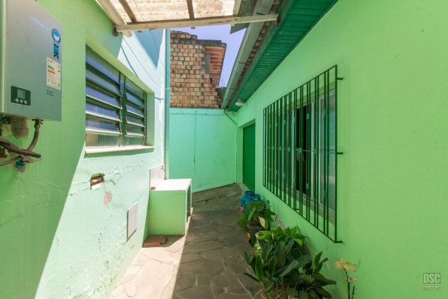 Imagem Casa com 3 Quartos à Venda, 216 m² em Vila Nova - Porto Alegre Imagem Casa com 3 Quartos à Venda, 216 m² em Vila Nova - Porto Alegre