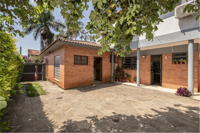 Imagem Casa com 4 Quartos à Venda,  em Três Figueiras - Porto Alegre