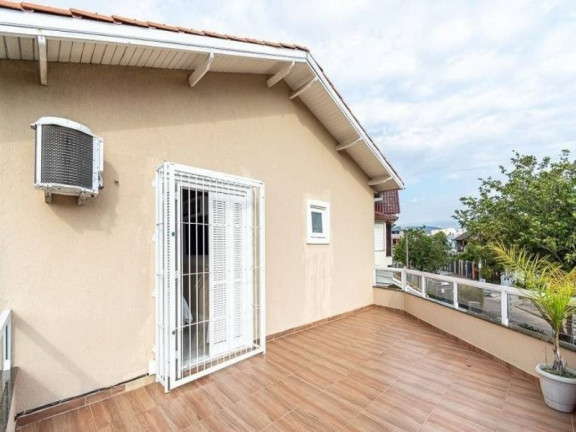 Imagem Casa com 3 Quartos à Venda, 164 m² em Ecoville - Porto Alegre Imagem Casa com 3 Quartos à Venda, 164 m² em Ecoville - Porto Alegre
