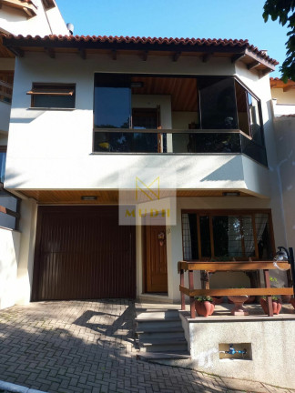 Imagem Casa de Condomínio com 3 Quartos à Venda, 182 m² em Nonoai - Porto Alegre Imagem Casa de Condomínio com 3 Quartos à Venda, 182 m² em Nonoai - Porto Alegre
