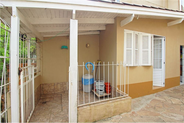 Imagem Casa com 3 Quartos à Venda, 198 m² em Medianeira - Porto Alegre