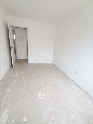 Imagem Casa de Condomínio com 2 Quartos à Venda, 64 m² em Vila Nova - Porto Alegre Imagem Casa de Condomínio com 2 Quartos à Venda, 64 m² em Vila Nova - Porto Alegre
