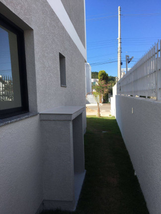 Imagem Casa de Condomínio com 3 Quartos à Venda, 130 m² em Cachoeira Do Bom Jesus - Florianópolis