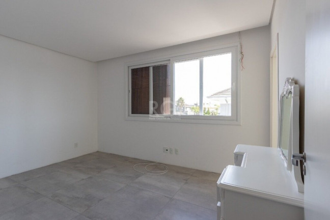 Imagem Casa de Condomínio com 4 Quartos à Venda, 403 m² em Belém Novo - Porto Alegre