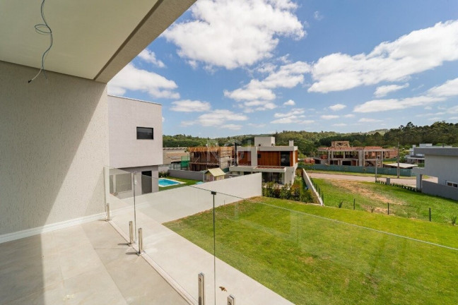Imagem Casa de Condomínio com 3 Quartos à Venda, 300 m² em Vila Nova - Porto Alegre Imagem Casa de Condomínio com 3 Quartos à Venda, 300 m² em Vila Nova - Porto Alegre