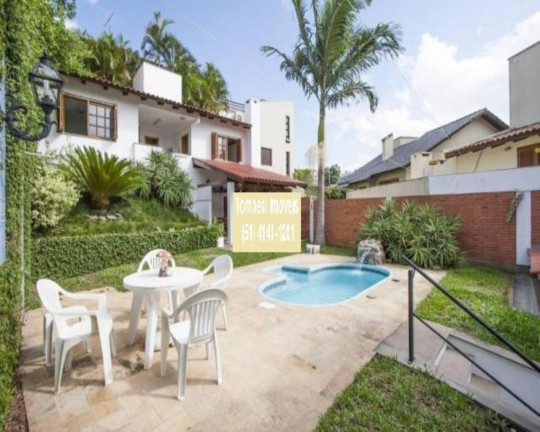 Imagem Casa com 5 Quartos à Venda, 265 m² em Chácara Das Pedras - Porto Alegre Imagem Casa com 5 Quartos à Venda, 265 m² em Chácara Das Pedras - Porto Alegre