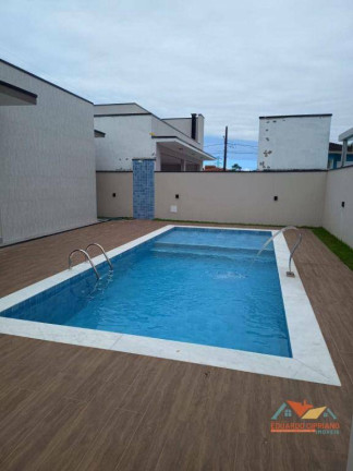 Imagem Sobrado com 4 Quartos à Venda, 223 m² em Massaguaçu - Caraguatatuba