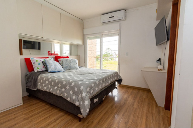 Imagem Casa com 3 Quartos à Venda, 111 m² em Igara - Canoas Imagem Casa com 3 Quartos à Venda, 111 m² em Igara - Canoas