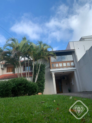 Imagem Casa de Condomínio com 4 Quartos à Venda, em Ipanema - Porto Alegre Imagem Casa de Condomínio com 4 Quartos à Venda, em Ipanema - Porto Alegre