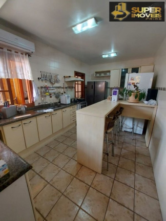 Imagem Casa com 4 Quartos à Venda, 360 m² em Centro - Pelotas