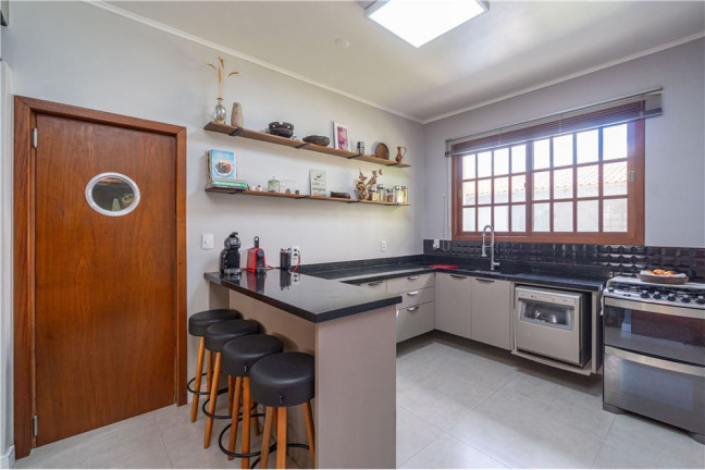 Imagem Casa com 4 Quartos à Venda, 300 m² em Jardim Lindóia - Porto Alegre Imagem Casa com 4 Quartos à Venda, 300 m² em Jardim Lindóia - Porto Alegre